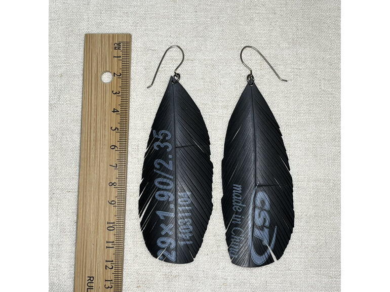 Altitude earrings with text 'CST'