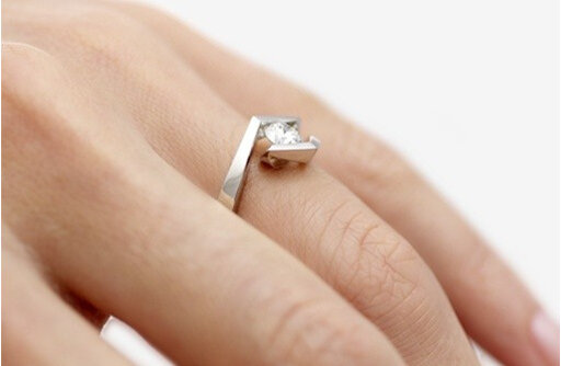Croft Brilliant cut modern platinum diamond ring on hand