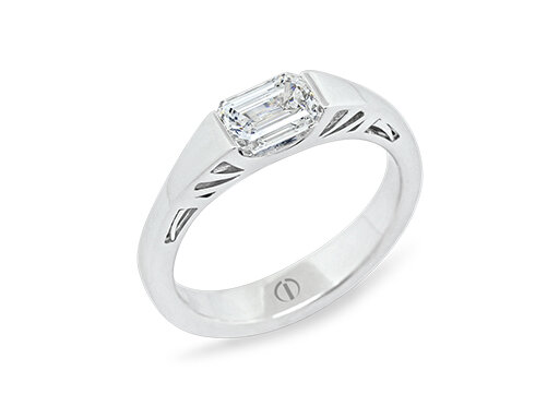 Designer art deco white gold emerald cut diamond engagement ring