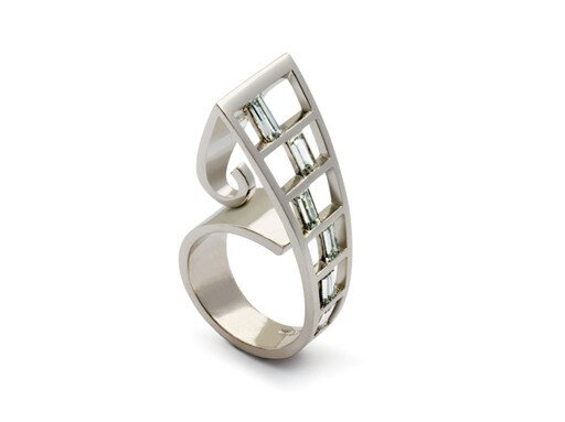 Designer baguette cut white gold contemporary diamond dress ring