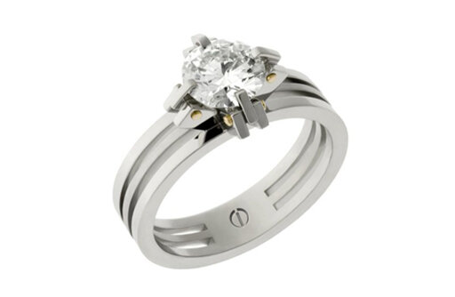 Designer claw setting platinum and gold round brilliant diamond engagement ring