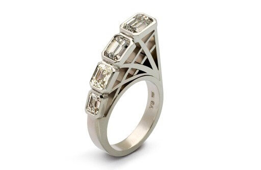 Designer emerald cut diamond platinum contemporary dress ring