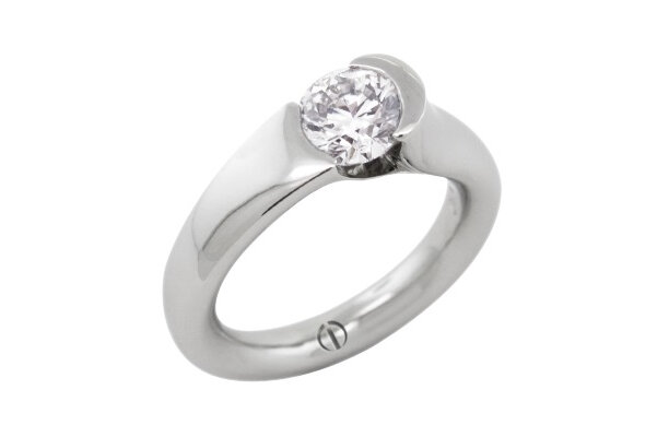 Designer round brilliant diamond tension set platinum engagement ring