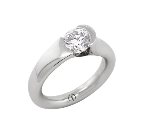 Designer round brilliant diamond tension set platinum engagement ring