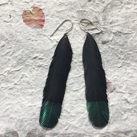 Hail earrings with emerald tips