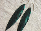 Katipo earrings with emerald