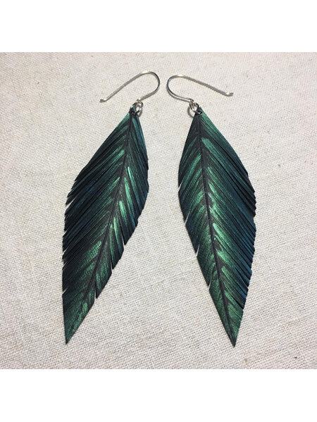 Pinned earrings with emerald