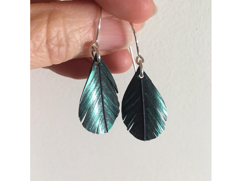 Tear drop earrings with emerald