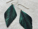Tempt earrings with emerald