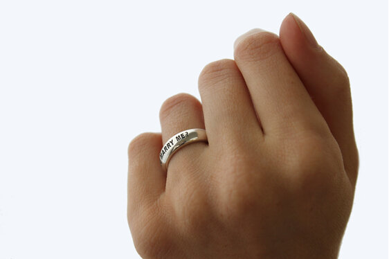 Wilshi classic proposal ring on the hand