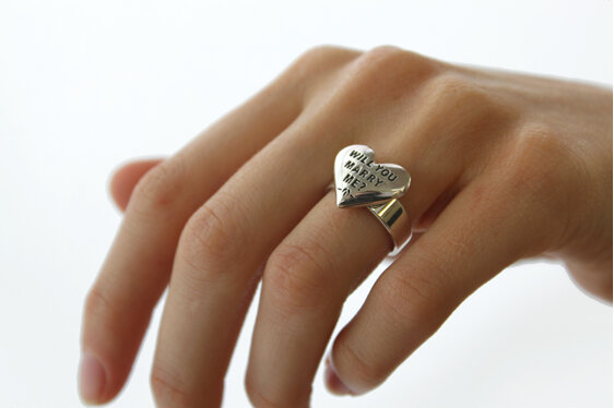 Wilshi heart proposal ring on the hand