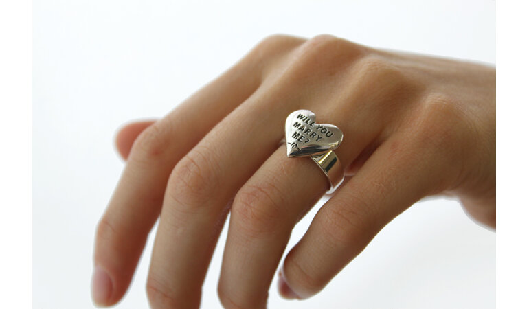 Wilshi heart proposal ring on the hand