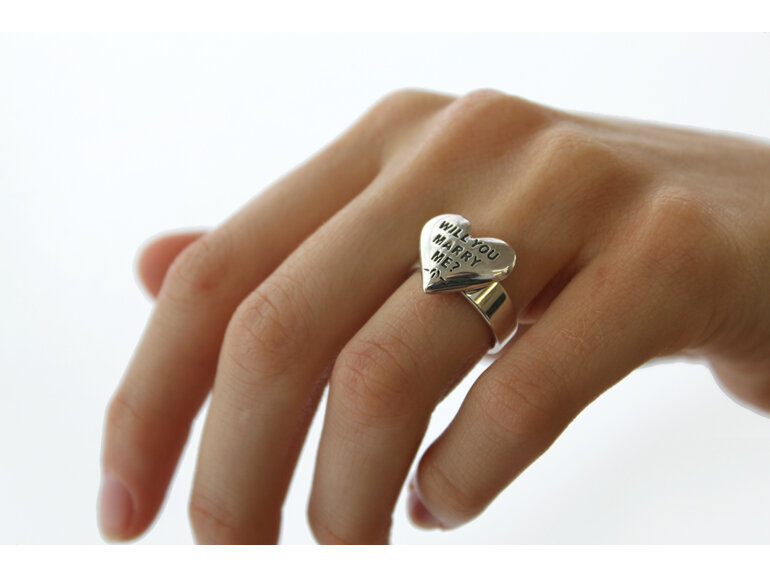 Wilshi heart proposal ring on the hand